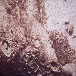 Pluto in True Color